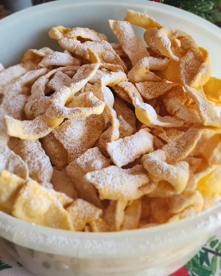 Kroštule, crisp Dalmatian fried pastry ribbons dusted with icing sugar